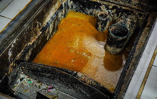 neglecting grease trap cleaning can cause foul odors, sanitation issues, and costly repairs